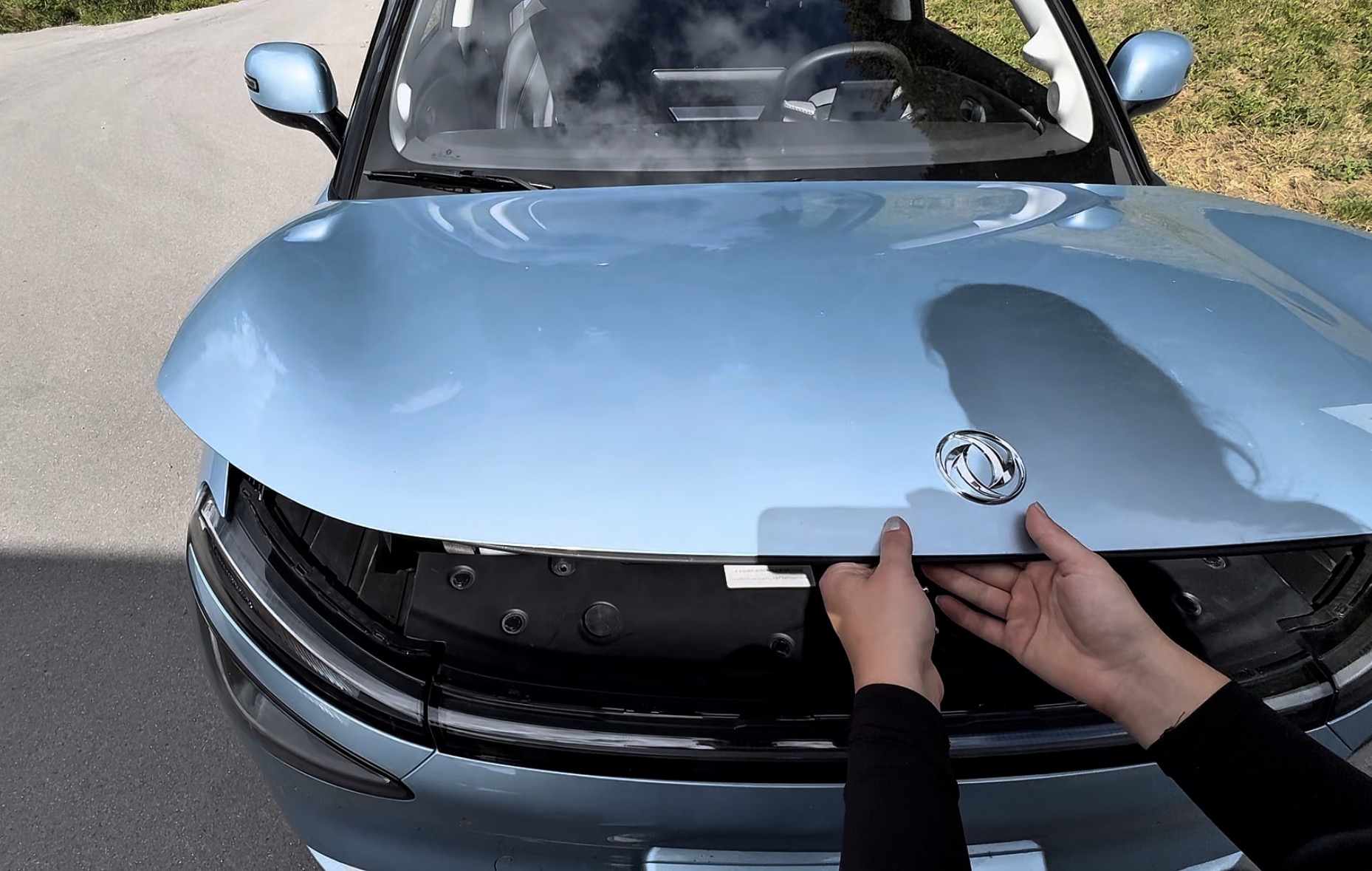 Step 1: Open the front compartment